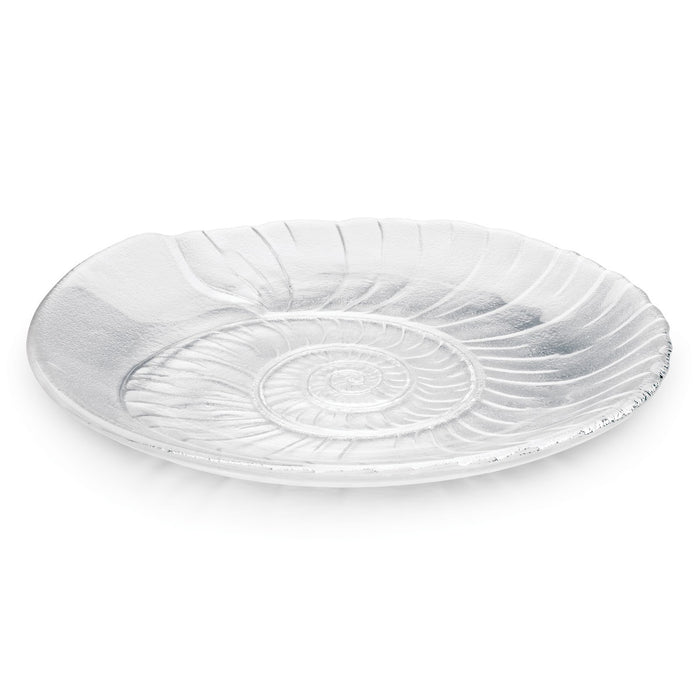 White oval platter with embossed spiral shell pattern and textured rim.