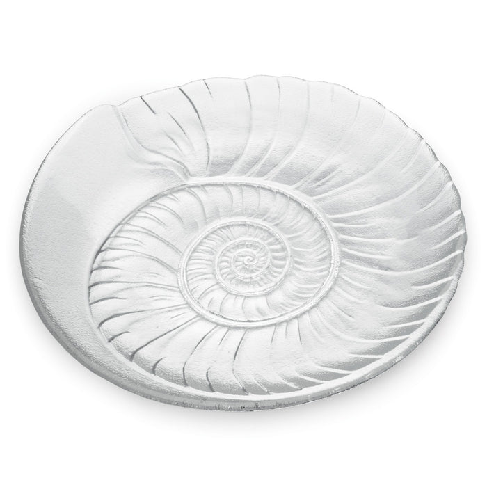 White shell-shaped platter with concentric spiral ridges radiating from center.