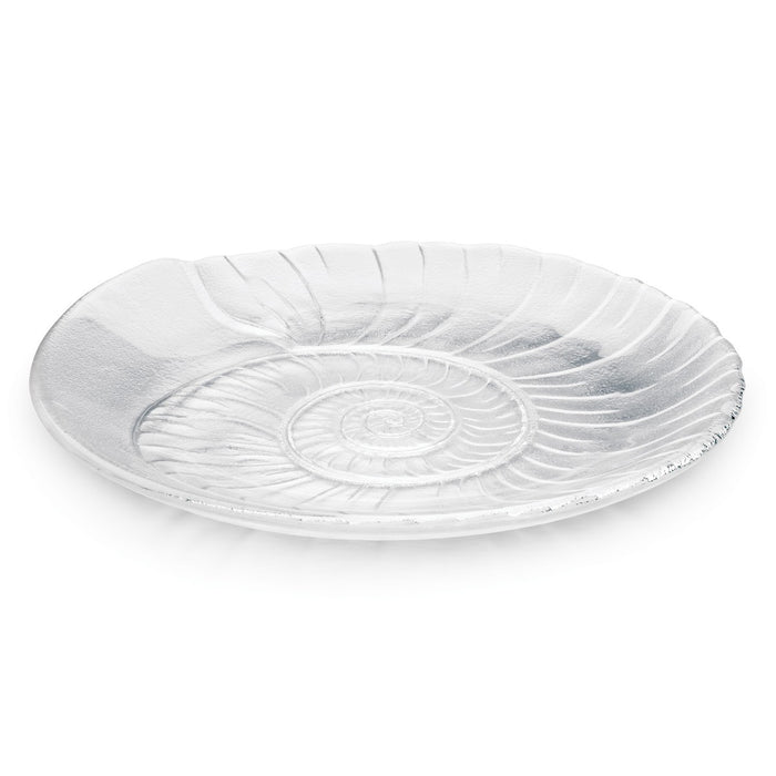 White ceramic platter with spiral shell relief pattern and textured rim.