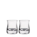 Two clear double old-fashioned glasses with curved sides and weighted bases, each holding a small amount of liquid.