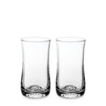 Two clear glass tumblers with curved sides and weighted bases displayed side by side.