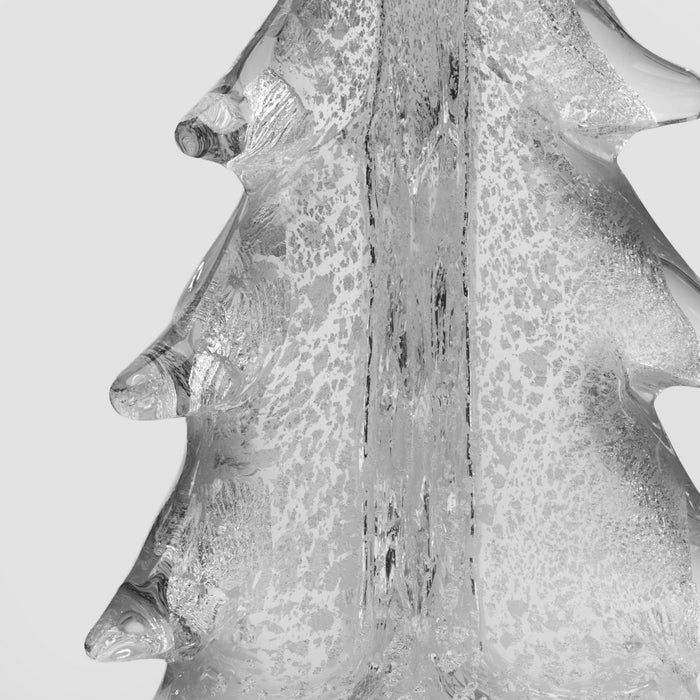 Silver glitter evergreen tree decoration with textured surface and pointed branches.