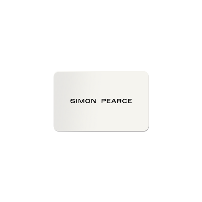 Beige rectangular gift card with "SIMON PEARCE" text in black letters.