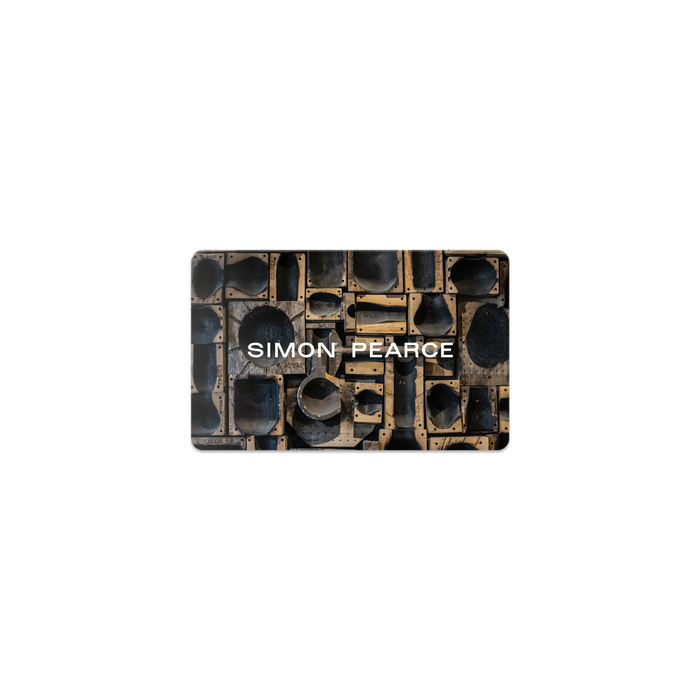 Simon Pearce digital gift card with black and gold geometric pattern design on rectangular card.