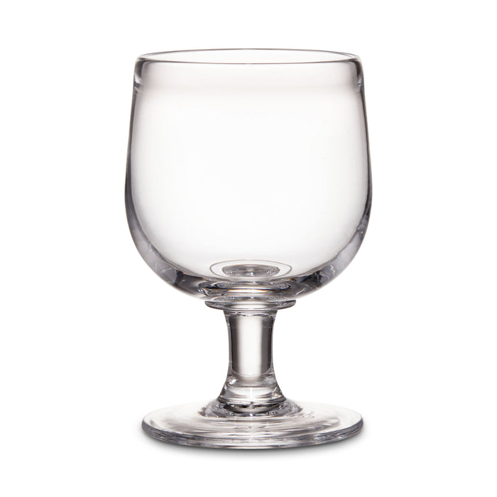 Clear glass goblet with rounded bowl, short stem, and circular base.