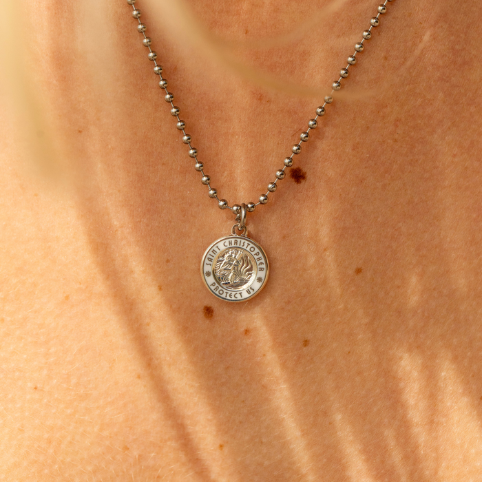 small silver white St. Christopher close up