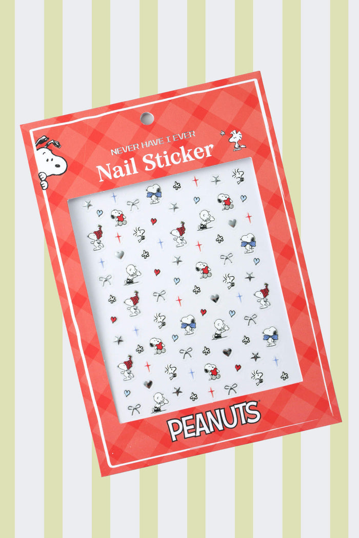Sheet of Peanuts nail stickers featuring Snoopy and Charlie Brown designs with hearts and bows.