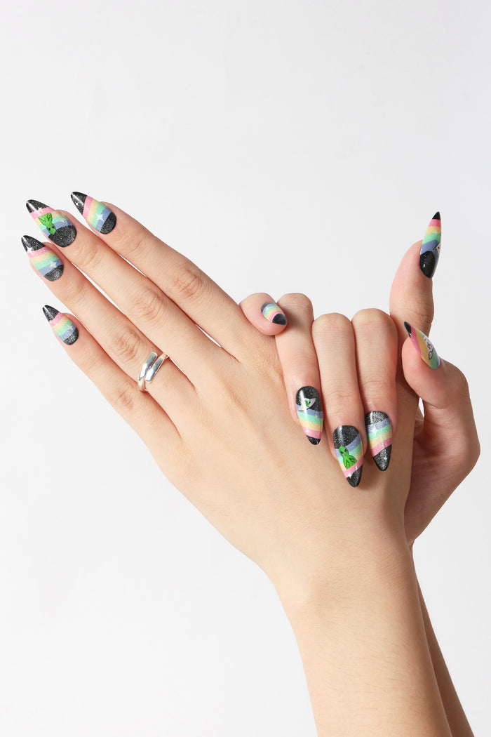 Spaced Out Ripndip press-on nails with alien and rainbow design.