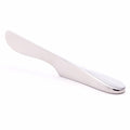 Stainless steel butter knife with curved silver blade and handle on white background.