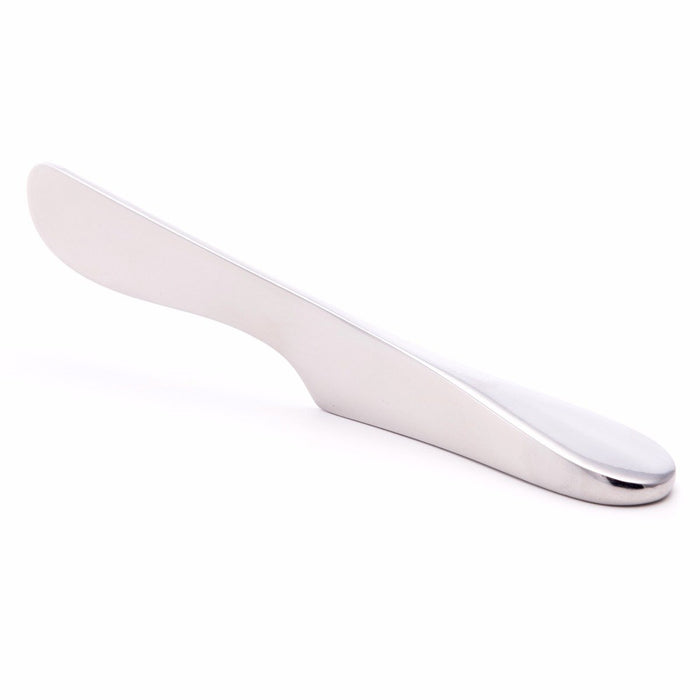 Stainless steel butter knife with curved silver blade and handle on white background.