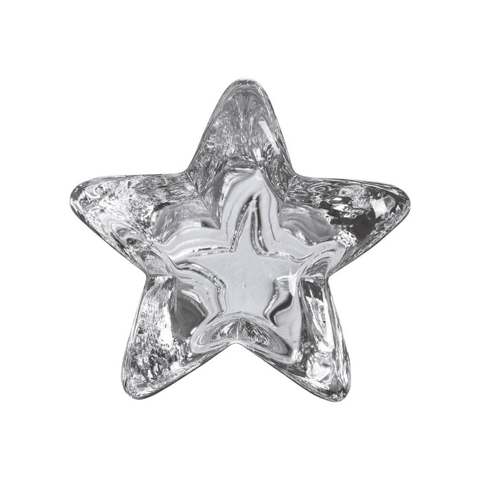 Clear glass star-shaped paperweight with textured surface and hollow center cavity.