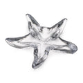 Silver and white starfish-shaped dish with five pointed arms and textured surface detail.