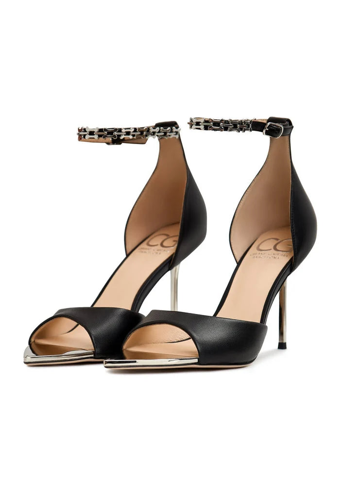 A pair of stylish black stiletto high heel sandals, perfect for a night out on the town.
