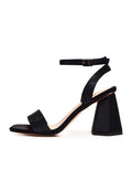 A stylish pair of women's black rhinestone block heel strappy sandals, perfect for a glamorous night out.