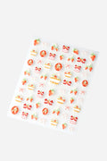 Sheet of cute strawberry and bow nail stickers with 3D embossed designs.