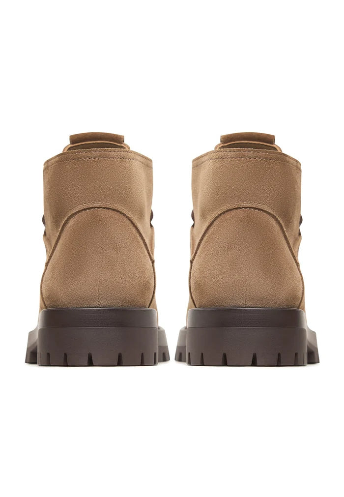 A fashionable pair of beige suede lace-up ankle boots by Mavi.