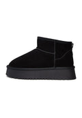 A stylish pair of black suede platform boots - perfect for the winter season and trendy fashion enthusiasts.