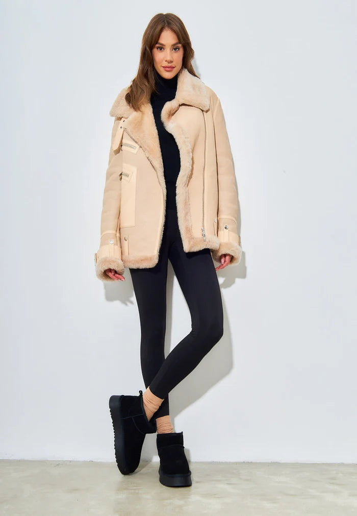 A trendy pair of black suede winter platform boots, perfect for staying stylish and warm during the winter season.