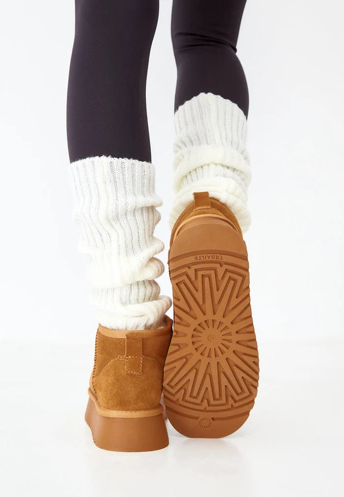 A trendy pair of brown suede platform winter boots, perfect for adding style and warmth to your winter fashion looks.
