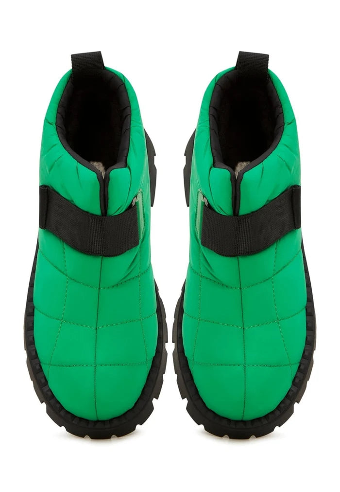 Stay cozy and stylish this winter with these green suede wool-lined boots - the perfect choice for keeping your feet warm on cold days.