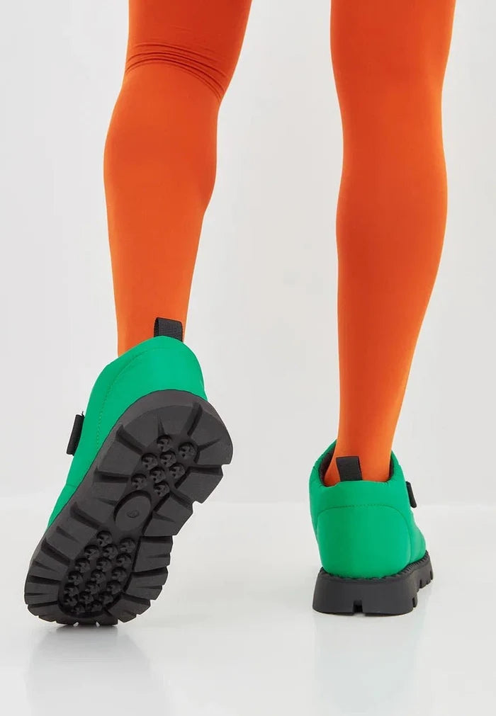 Stay cozy all winter long with these stylish green suede boots lined with wool for extra warmth. Perfect for those cold days ahead!
