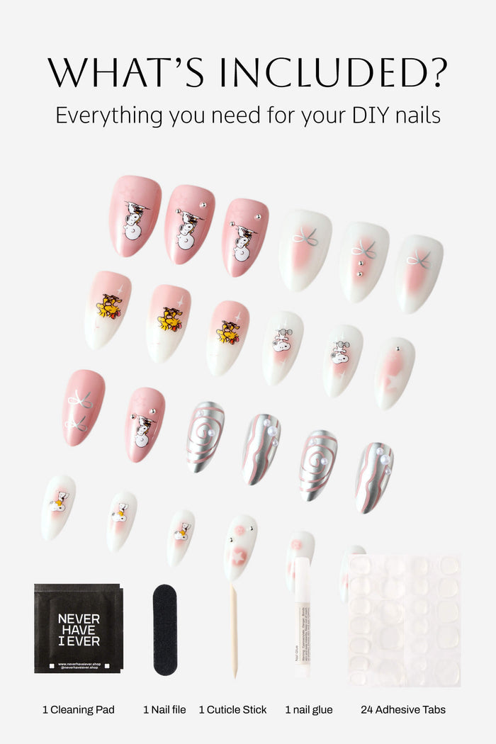 Almond press-on nails with Snoopy, Woodstock, pink swirls, and metallic accents, plus a nail kit.