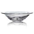 Clear glass bowl with swirled dark gray and black striations throughout the body and wide flared rim.