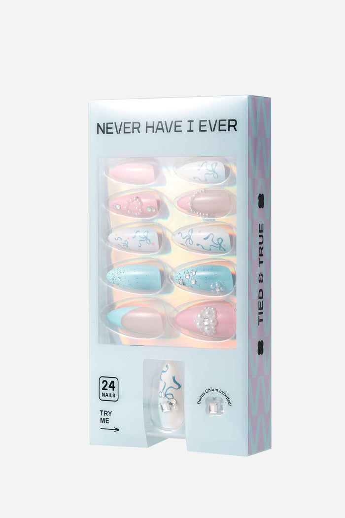 TIED AND TRUE almond press-on nails packaging, 24 nails, pastel pink, blue, white with bows, pearls, gems, bonus charm.