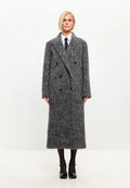 Stay warm and chic this winter with the trendy gray Eira coat - a stylish oversized wool coat that's perfect for any winter fashion outfit.