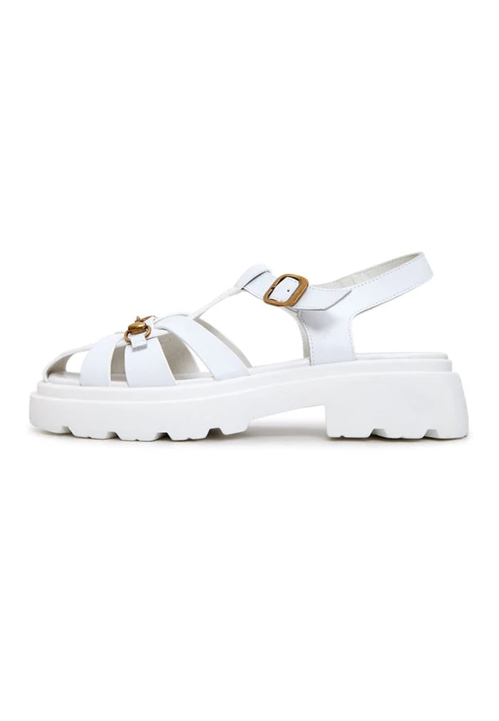 A pair of stylish white platform sandals, perfect for a classic urban look.