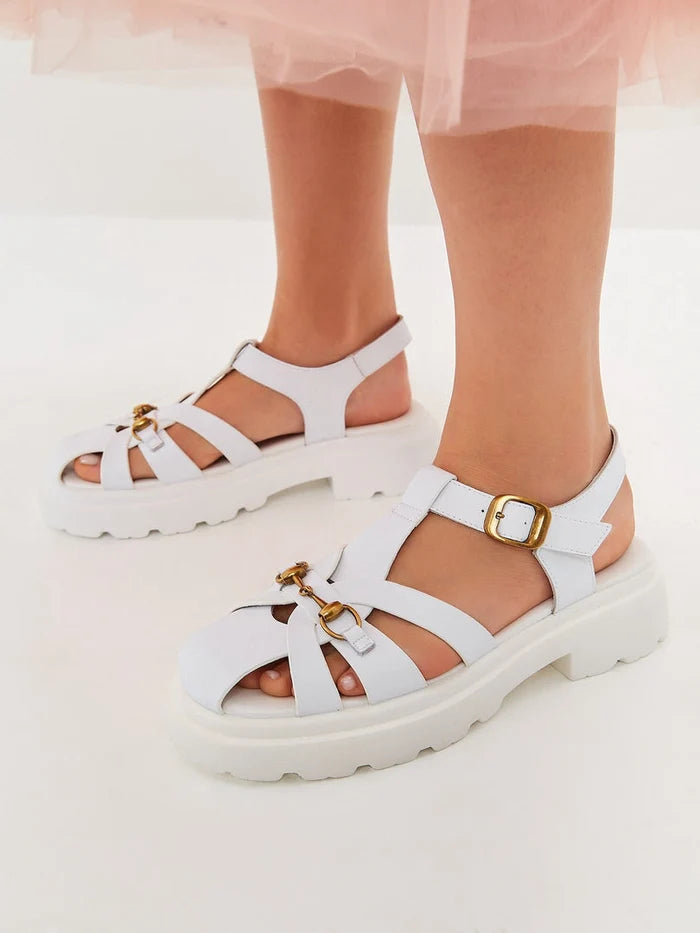 A stylish pair of urban classic platform sandals in white, perfect for any modern outfit.