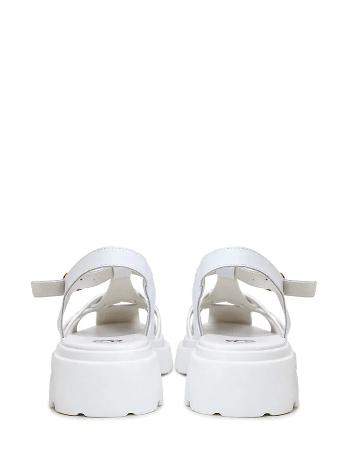 A pair of trendy urban classic platform sandals in white, perfect for a chic and stylish look.