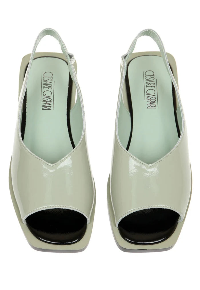 A stylish pair of open toe leather sandals, perfect for summer wear as urban fashion footwear.