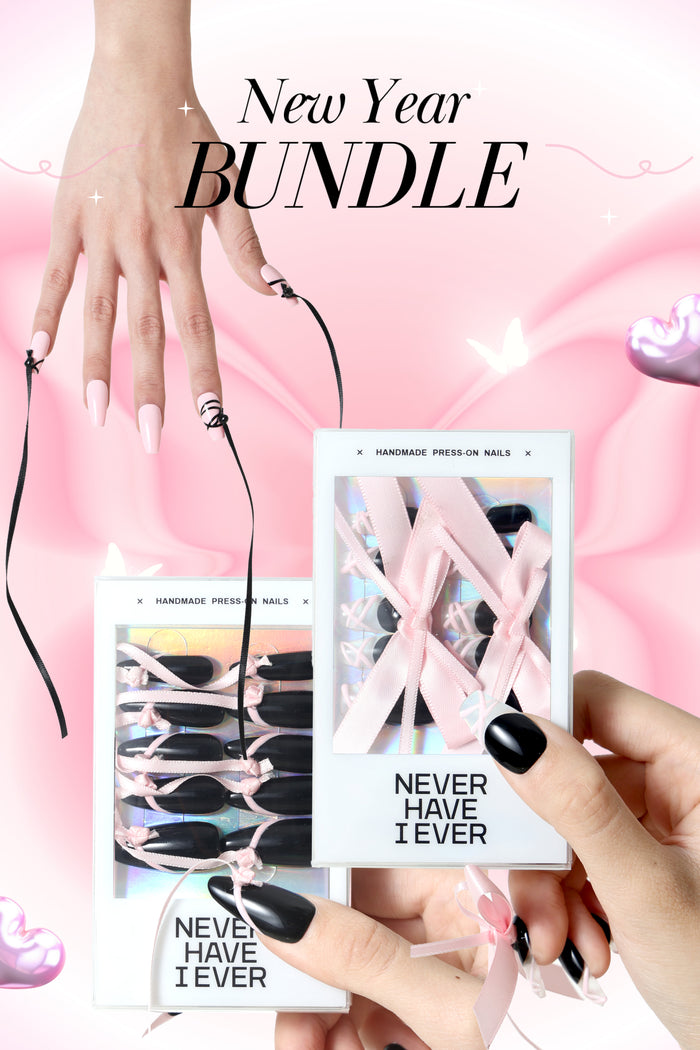 New Year Bundle: Hands display pink coffin nails with black ribbon and black oval nails with pink bows from Never Have I Ever.