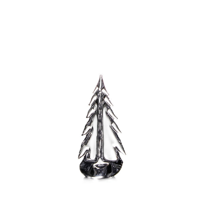 Clear glass evergreen tree figurine with pointed top and layered branches on dark base.
