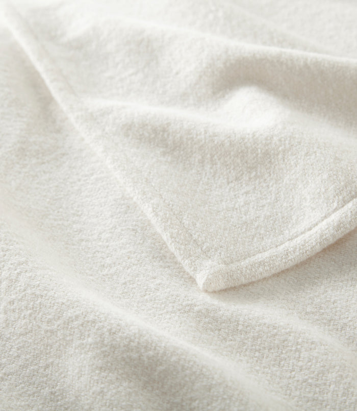 Corner hem detail on throw blanket, Pearl