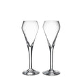 Two clear glass champagne flutes with tapered bowls and thin stems on round bases.