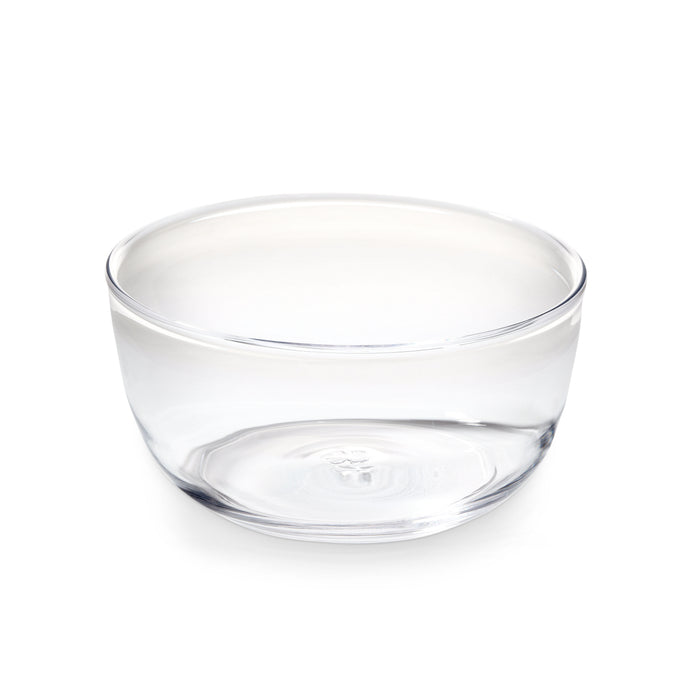 Clear glass bowl with wide curved sides and flat bottom.