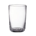 Clear glass tumbler with straight sides and rounded rim, textured base detail visible.