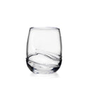 Clear glass tumbler with curved textured bands around the lower half.