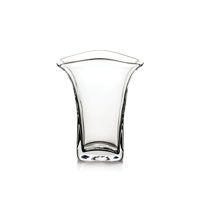 Clear glass tumbler with flared rim and curved sides tapering toward a squared base.