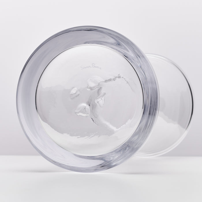 Two clear glass bowls with gray-tinted rims, one shown from above with visible interior texture and one behind it.