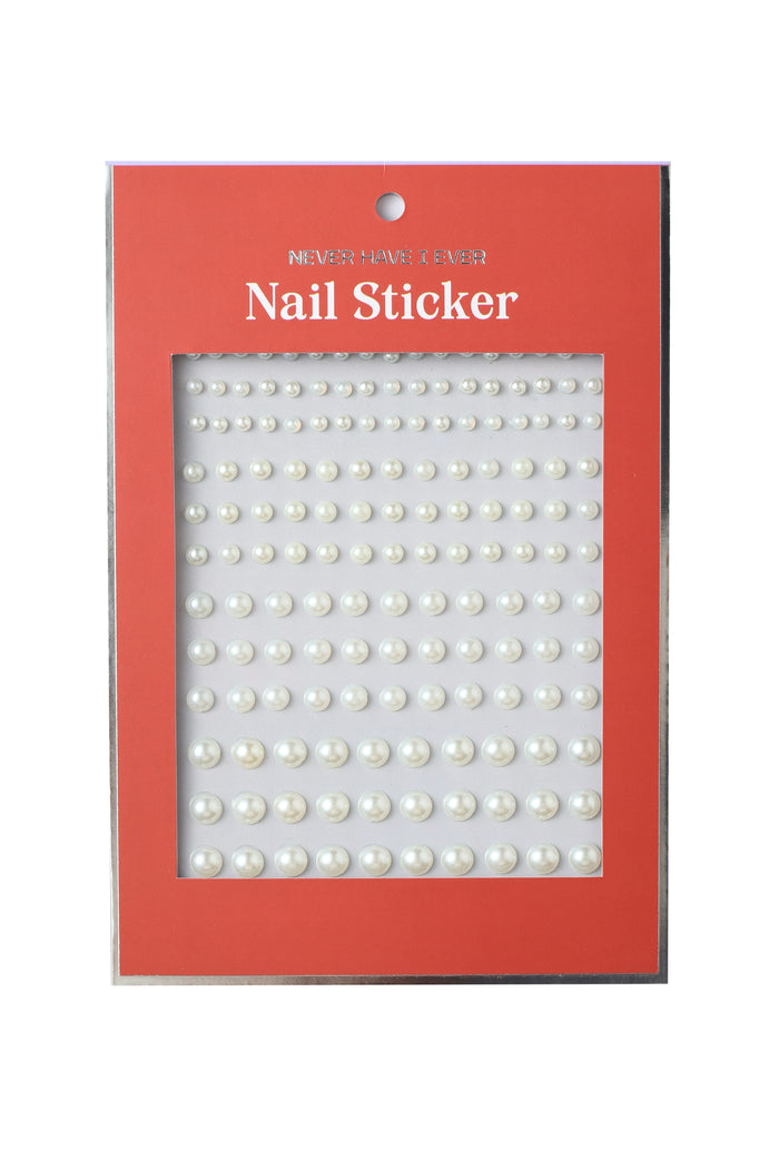 Sheet of white pearl nail stickers with various sizes on a red backing card.