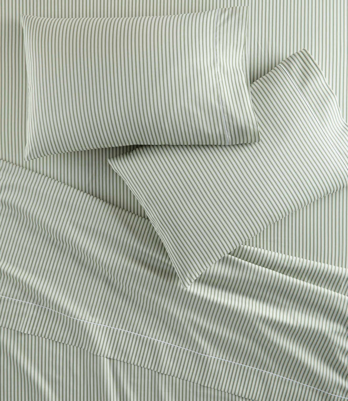 Windsor Stripe Pillowcases on bed, Stripe Moss