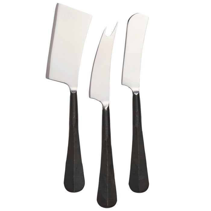 Three cheese knives with stainless steel blades and black tapered handles, including flat, forked, and serrated styles.