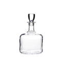 Clear glass decanter with a rounded base, tapered neck, and glass stopper.