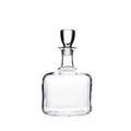 Clear glass decanter with a narrow neck, wide rounded body, and a rounded glass stopper.