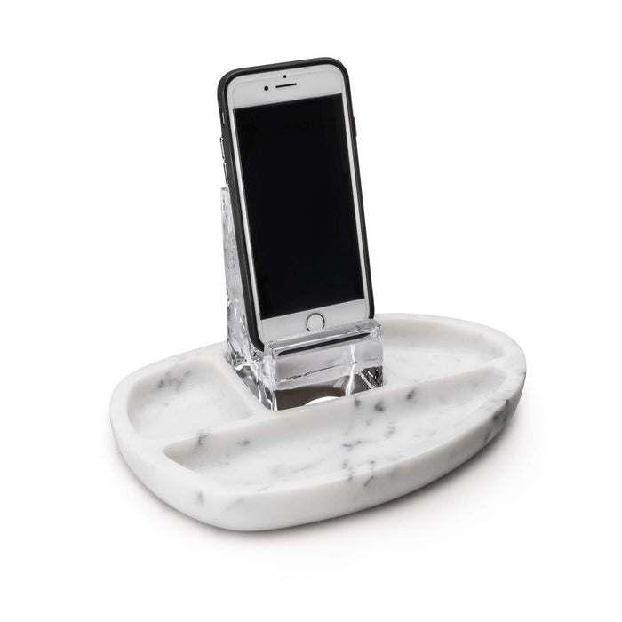 White marble desk caddy with phone slot and compartments for holding a smartphone and accessories.
