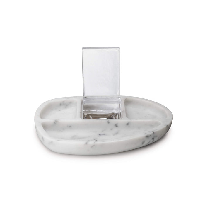 White marble desk caddy with oval base and clear glass pen holder in center.