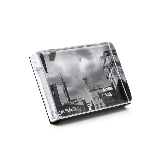 Horizontal acrylic photo block displaying black and white cityscape photograph with architectural buildings.